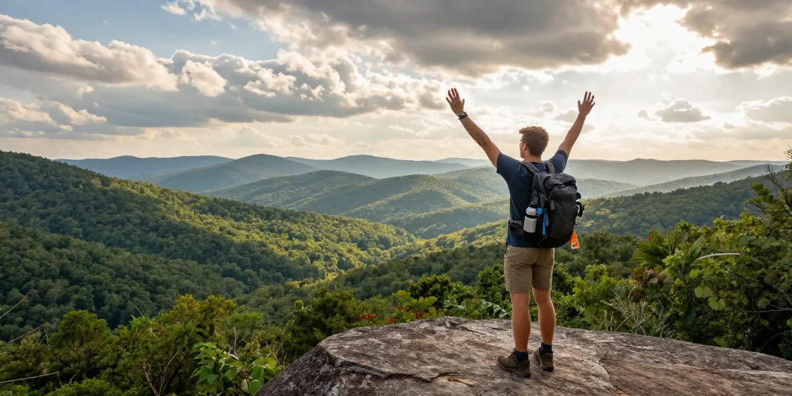 Traveler celebrating outdoors in Alabama, exploring nature with enthusiasm, Bradley Robinson Alabama